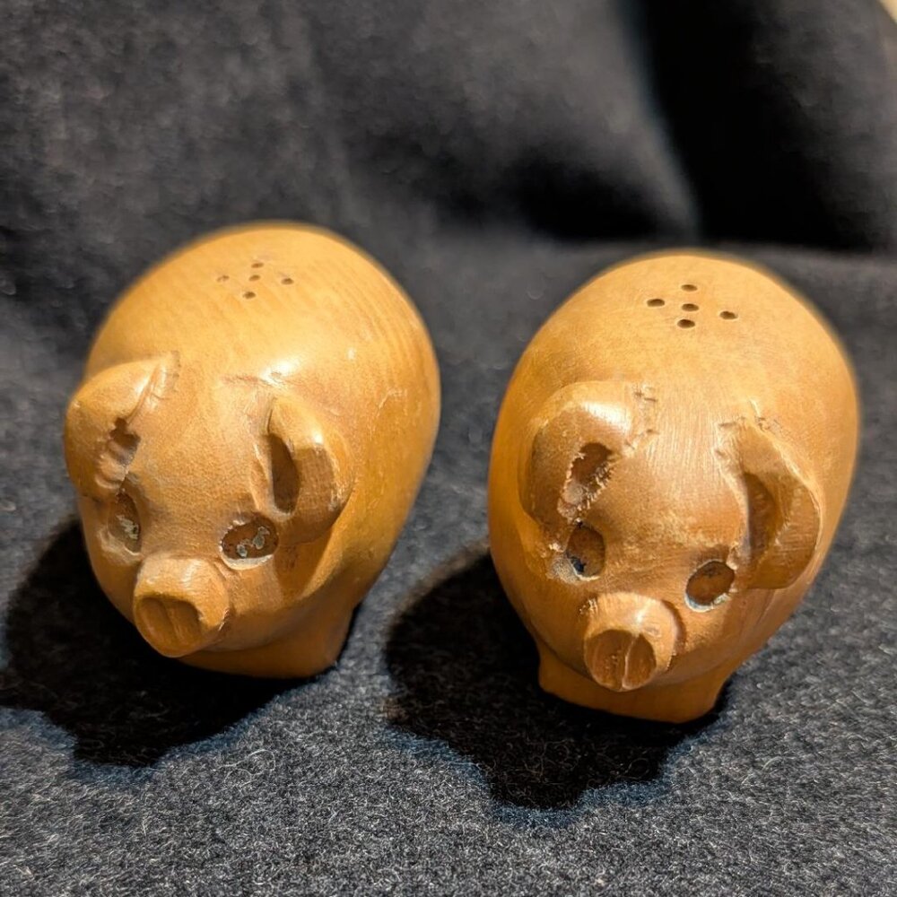 Wooden pig-shaped salt and pepper shakers